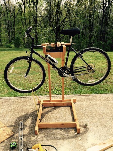 A stationary bike stand allows those to have the comfort of their own bike all while trying to get a. Homemade Wooden Bicycle Stand With Dual Mounting ...