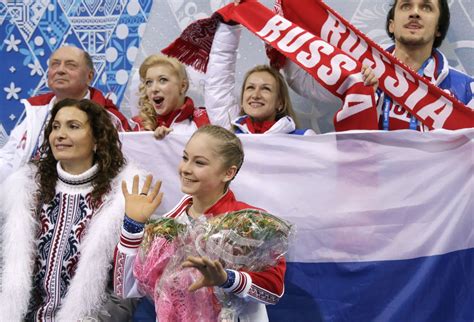 Yulia Lipnitskaya Of Russia Centre Waits For Her Results After