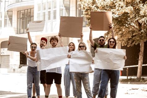 Diverse Group Of People Protesting With Blank Signs Protest Against