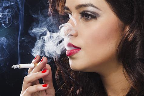 Indian Glamorous Young Beautiful Latin Woman Smoking Cigarette