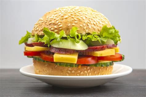 Hamburger With Vegetables And Sausage Fast Food And Breakfast Stock