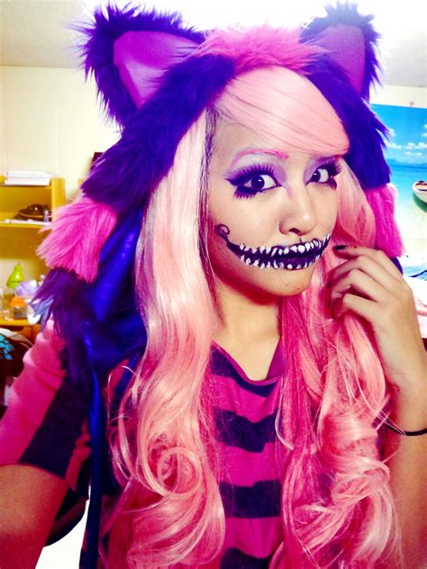 He's brilliantly purple and hot pink, ever smiling and entirely unnatural. My Cheshire Cat costume from last year. If you want to try this look, make sure to bring a str ...