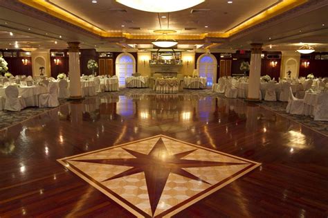 the vanderbilt ballroom at watermill caterers features integrated led lighting that can be