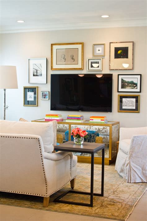 Balanced Gallery Wall With Gold Frames Around Tv Via Material Girls