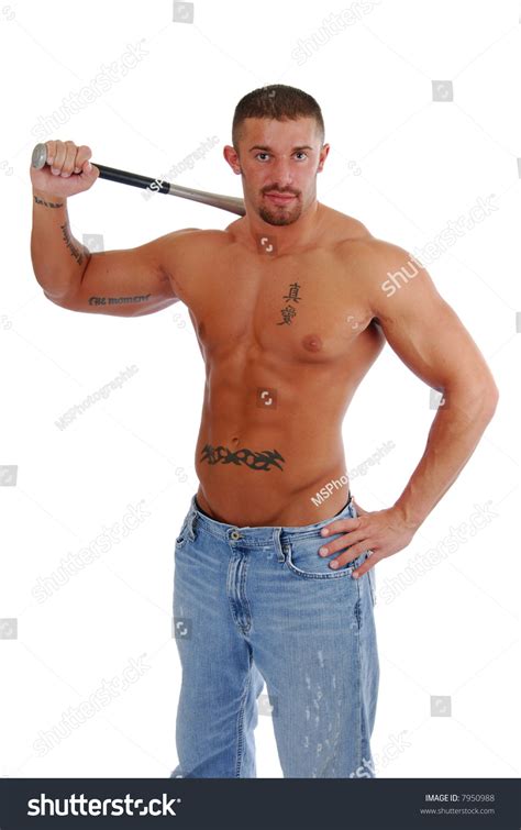 A Muscular Man Holding A Baseball Bat Over His Royalty Free Stock