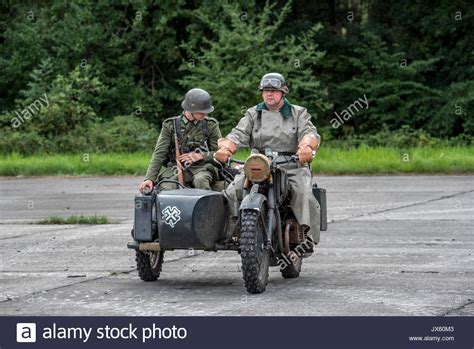German Ww2 Soldiers Riding On Bmw Military Motorcycle With