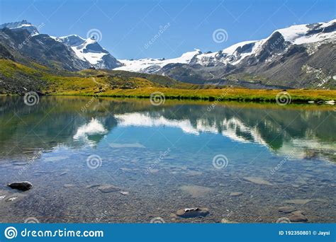 Beautiful Swiss Alps Landscape With Stellisee Lake And