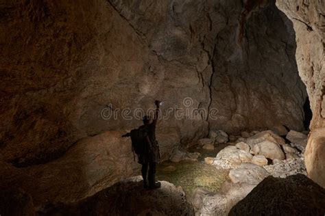 Photographer Shooting In A Cave Stock Image Image Of People Leisure