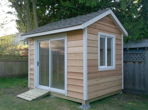This Is An 8x10 Shed With Cedar Siding With A Sliding Door Backyard
