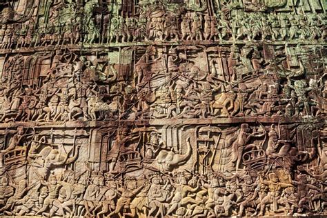 Ancient Stone Carving On The Wall At Angkor Thom Stock Photo Image