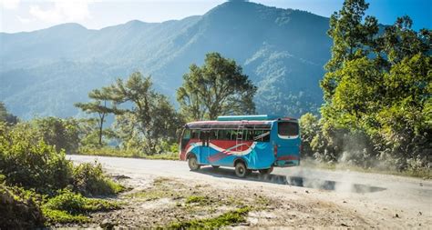 Premium Photo Colourful Local Bus On Mountain Road Annapurna Area Nepal