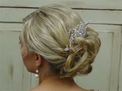 It shouldn't depend solely on what looks good on you, but should complement your wedding dress and neckline as well. Wedding Updo