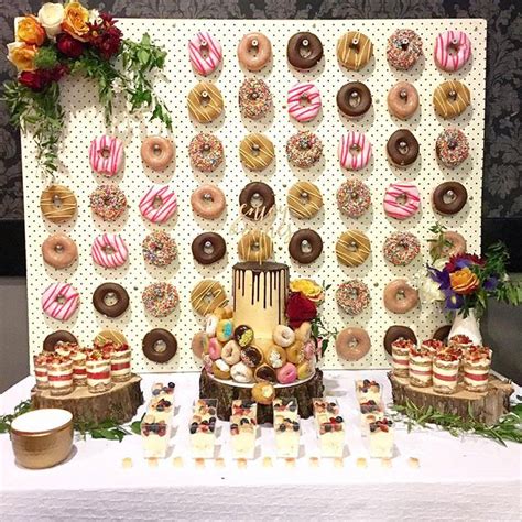 9 diy donut wall ideas you ll want to steal donuts para boda mesa de postres para boda