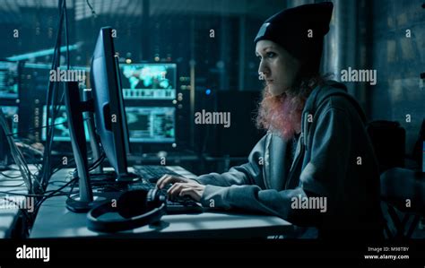 Nonconformist Teenage Hacker Girl Using Computer For Attacking