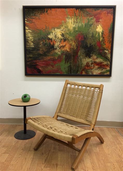 The wishbone chair, also known as the ch24 chair or y chair is a chair designed by hans wegner in 1949 for carl hansen & søn. Hans Wegner style folding rope chair. Made in Yugoslavia ...