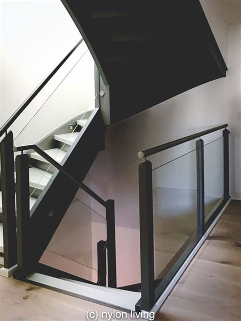 Milan vision glass balustrade and banisters in black walnut exclusive stair banister railings for staircases and landings this is a stairplan balustrade option sown here on a oak staircase 8mm. white Corian staircase style | stair materials | modern ...