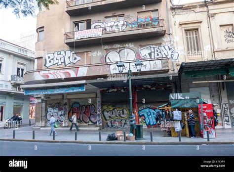 ATHENS, GREECE - OCTOBER 6 : A city street with abandoned building