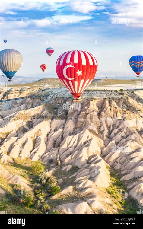 A Hot Air Balloon With A Turkish Flag Design Floats Over The Fairy