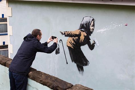 Street Art Depicting Sneezing Woman By Banksy Appears On Home