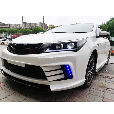 Go with the corolla le to gain fake wood trim, optitron gauges, power. Buy Toyota Corolla A2 Without LED Complete Body Kit ...