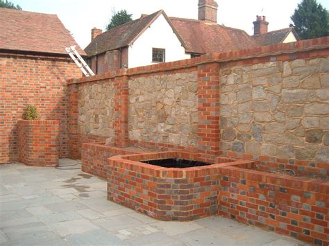Brick And Stone Ideas For The Garden Brick Planter Planter Wall Patio