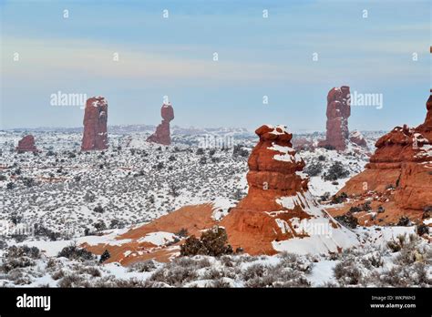Morning Skies Over The Snowy Garden Of Eden Arches National Park Utah