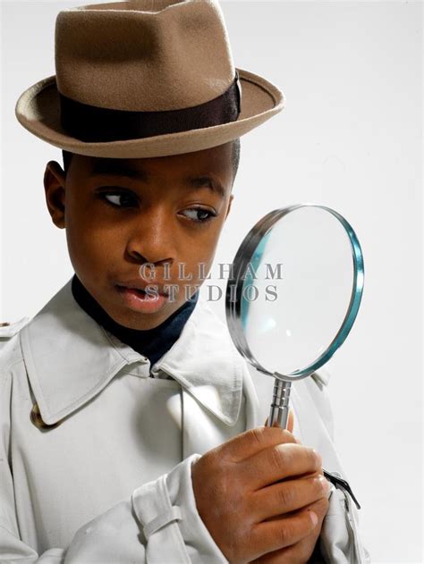 Child Wearing Detective Costume Holding Magnifying Glass By Gillham