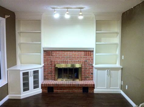 Built ins around stone fireplace exactly what i want. Built ins around fireplace- angled tv shelf | Built in ...