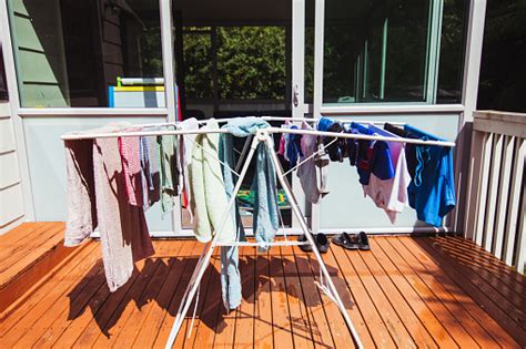 Clothes Are Hanging On Clothesline On Deck Stock Photo Download Image
