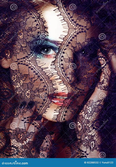 Portrait Of Beauty Blond Young Woman Through Black Lace Close Up Stock