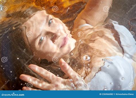 Beautiful Girl With Long Hair Underwater In The Swimming Pool Young Woman And Diving Stock