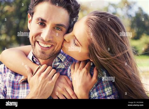 Big Kiss For My Man Closeup Portrait Of A Young Couple Sharing A