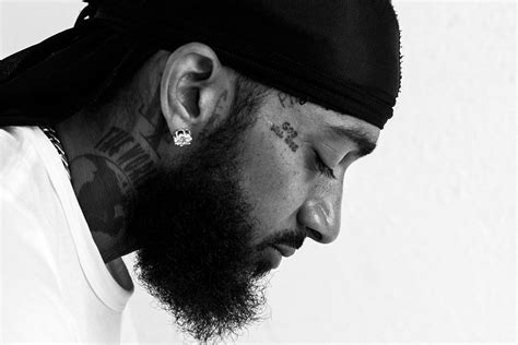 Black and white turns your image… well, you know. Nipsey Hussle Face Black and White Poster | Uncle Poster