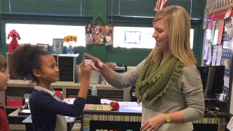 Third Grade Teacher Learns Handshakes For Each Student