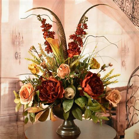 burnished reds and warm gold s define this exquisite silk floral and greenery ar… beautiful