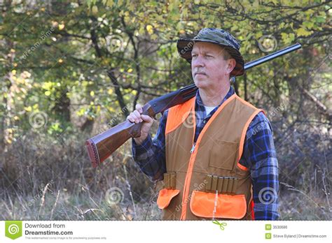 Man Hunting Stock Photo Image Of Grass Orange Weeds 3530686