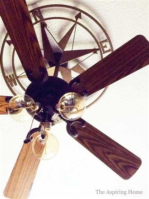 Looking for a unique ceiling medallion that is affordable & simple to create? Compass Metal Ceiling Medallion DIY From Wall Art