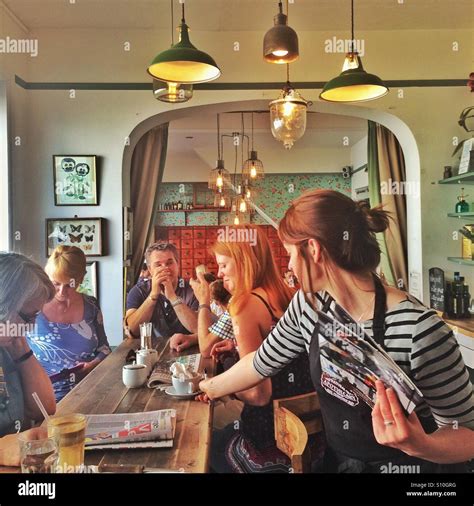 A Scene From A Busy Coffee Shop Stock Photo Royalty Free Image