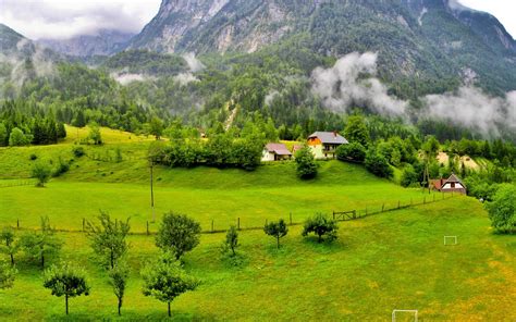 Slovenia Mountains Trees Wood Houses Clouds Grass Meadow Wallpaper