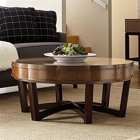 The corbin cocktail table has a silhouette that exemplifies modern iconic design. Miramar Round Cocktail Table American Drew | Furniture Cart