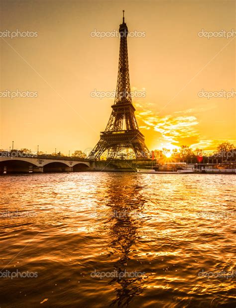 Eiffel Tower At Sunrise Paris Stock Photo By ©masterlu 35640679