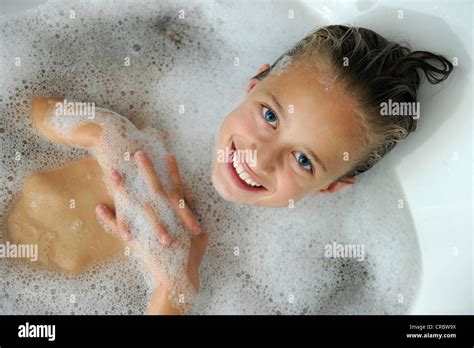 Young Girl In A Bathtub Stock Photo Alamy