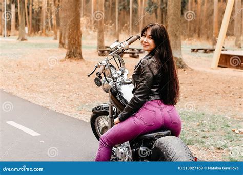 Beautiful Brunette Riding A Motorcycle In The Park Stock Image Image Of Brunette Nature