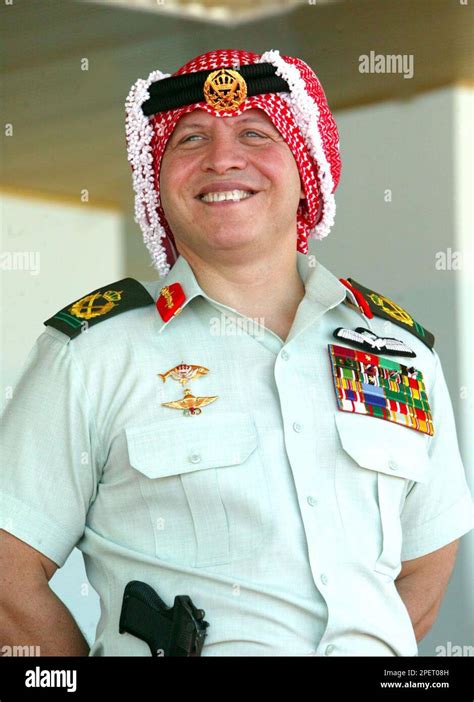 King Abdullah Ii Of Jordan Smiles During The Graduation Ceremony Of The Military Wing Of Moutah