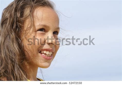 Cheerful Preteen Girl On Blue Sky Stock Photo 12472150 Shutterstock