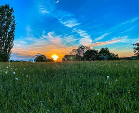 Sunset Over A Meadow Stock Photo Image Of Farmland 181200194