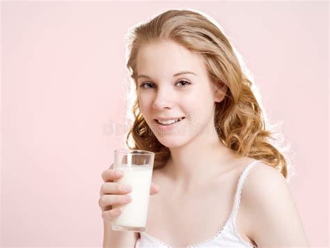 Girl Licking Milk From A Wine Glass Close Up Gray Background Stock