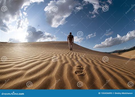 Lonely Man Walks In Desert Dunes Stock Image Image Of Lost Desert