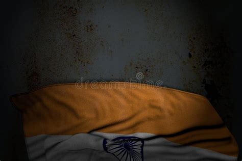Nice Dark Photo Of India Flag With Large Folds On Rusty Metal With
