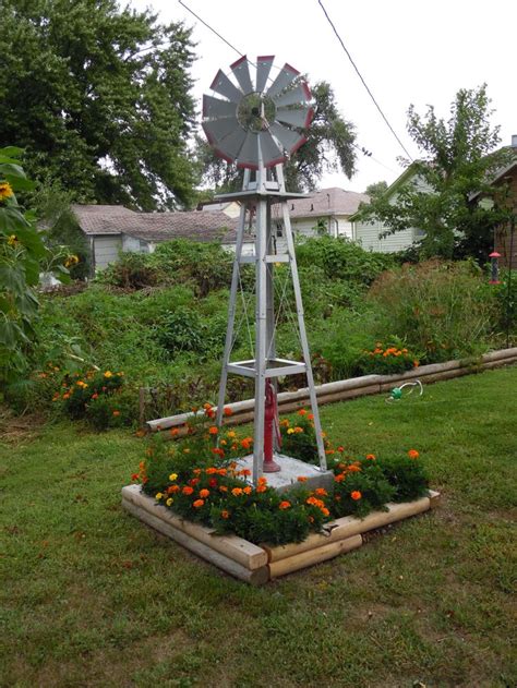 Check spelling or type a new query. our windmill | Garden windmill, Windmill landscaping ...